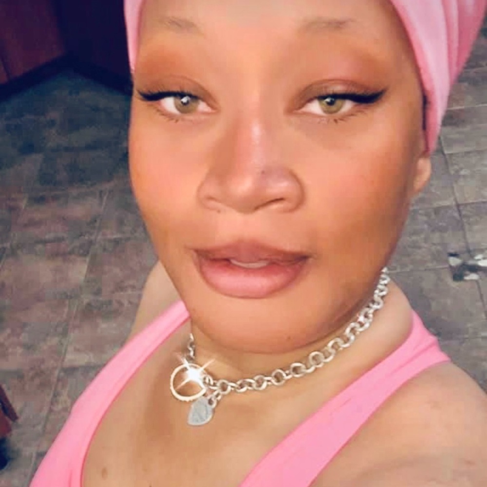 Pink Tank Top with Silver Chain Necklace not yet for sale though.